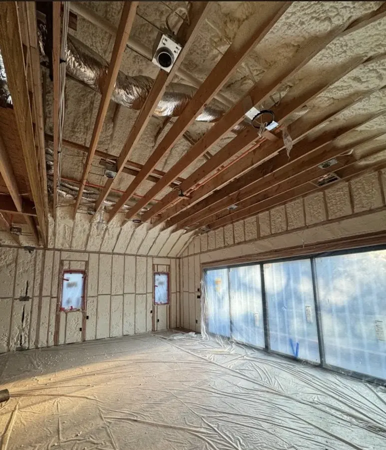 Interior walls and ceiling insulated with spray foam during new construction in Yorkshire